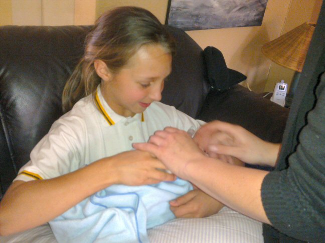 Tiffiny holds baby Alex