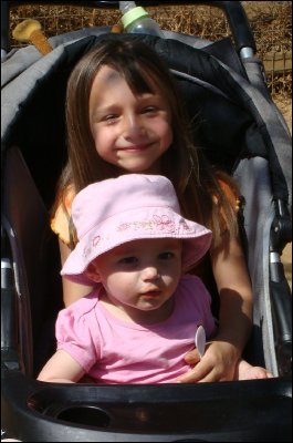 In the pram with baby sister